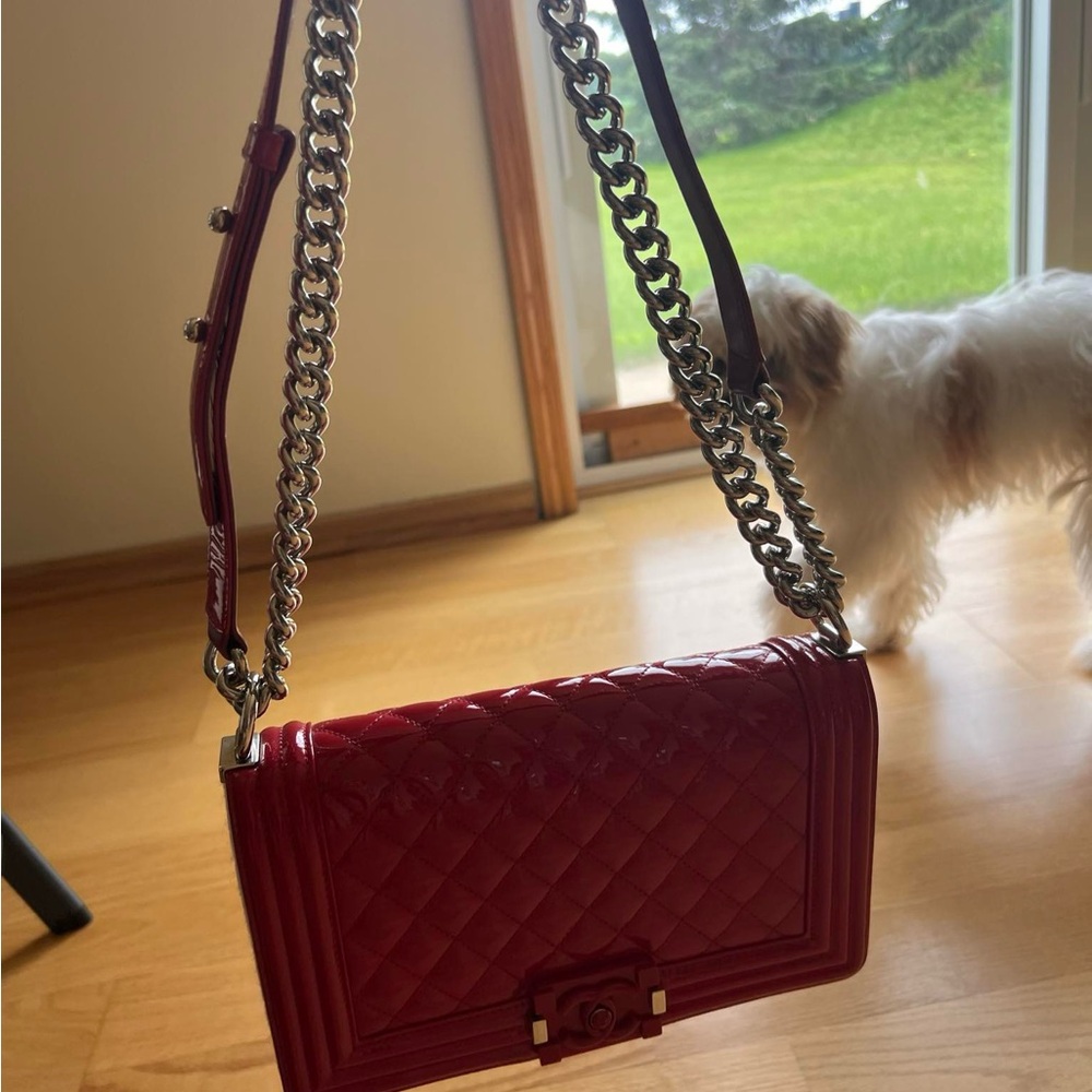 CHANEL Red Crossbody Bag with Quilted Chevron Pattern